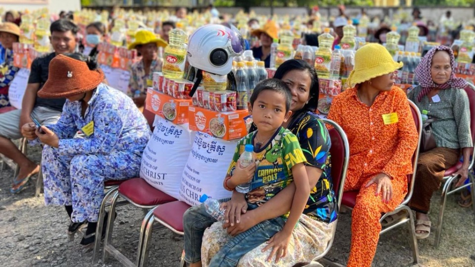 500 families from Kampong Thom Province, wait for the arrival of the Governor, before receiving the food donation from The Church of Jesus Christ of Latter-day Saints.