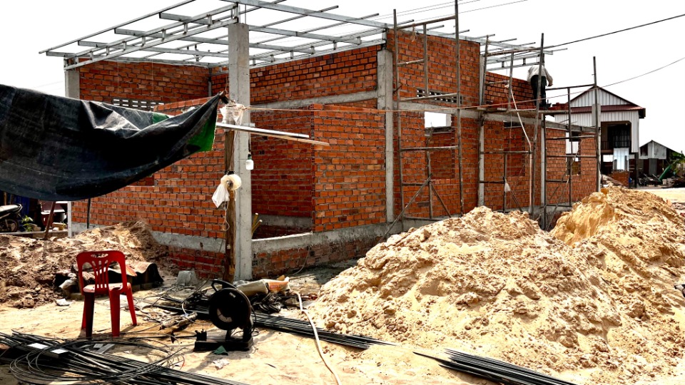 Building-foundations-of-faith-in-Run-Ta-Aek,-Cambodia.-May-2023.